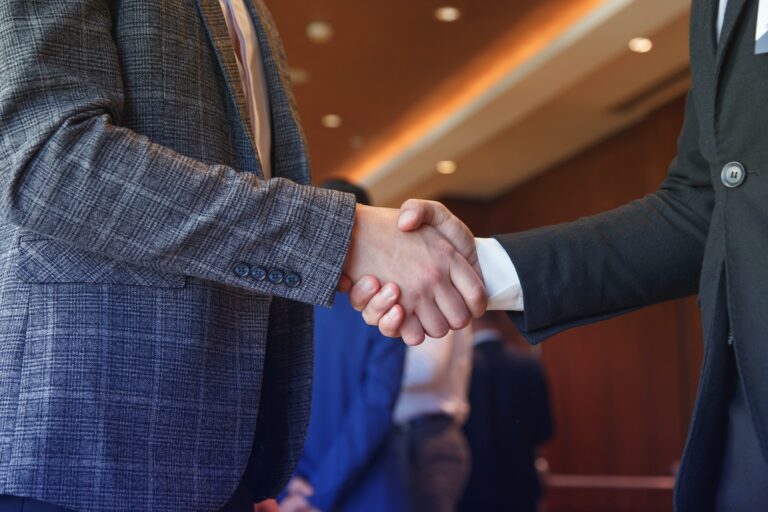 Businessmen shake hands